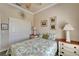 Relaxing bedroom with neutral tones, a comfortable bed, and ample closet space at 16135 Cape Coral Dr, Wimauma, FL 33598