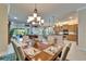 Spacious dining room seamlessly connects to the kitchen and living areas, perfect for entertaining guests at 16135 Cape Coral Dr, Wimauma, FL 33598