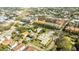 Expansive aerial view of a residential neighborhood with commercial buildings and lush trees at 2614 W Horatio St # 1, Tampa, FL 33609