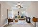 Comfortable living room with neutral colors, a ceiling fan, and natural light, creating a welcoming atmosphere at 2614 W Horatio St # 1, Tampa, FL 33609