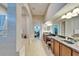 En suite bathroom with double sinks, soaking tub, vanity and walk-in closet at 2903 Marble Crest Dr, Land O Lakes, FL 34638