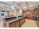 A well-equipped kitchen featuring granite counters, stainless steel appliances, and ample cabinet space at 2903 Marble Crest Dr, Land O Lakes, FL 34638