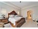 Spacious main bedroom with large windows and an arched doorway at 2903 Marble Crest Dr, Land O Lakes, FL 34638