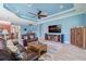 Spacious living room featuring modern decor, comfortable seating, and an open layout for seamless entertaining at 4822 Grand Banks Dr, Wimauma, FL 33598