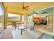 Inviting outdoor patio offering a serene setting for relaxation and enjoyment of the surrounding landscape at 4822 Grand Banks Dr, Wimauma, FL 33598