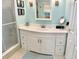 Stylish bathroom with a modern vanity, sleek hardware, and coastal color accents at 5108 Brittany S Dr # 204, St Petersburg, FL 33715