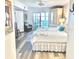 Inviting bedroom with access to a patio, complemented by a view of the outdoor scenery at 5108 Brittany S Dr # 204, St Petersburg, FL 33715