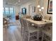 Bright dining area featuring tile floors and neutral decor, complemented by an open-concept layout at 5108 Brittany S Dr # 204, St Petersburg, FL 33715