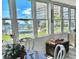 This bright dining area has large windows offering beautiful views of the water and the outdoors at 5108 Brittany S Dr # 204, St Petersburg, FL 33715