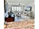 Bright and spacious living room with tile floors, ceiling fan, and neutral decor perfect for entertaining at 5108 Brittany S Dr # 204, St Petersburg, FL 33715
