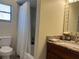 Cozy bathroom with a shower, tub, and updated fixtures at 6620 Jennifer Dr, Temple Terrace, FL 33617