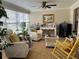 Inviting living room with neutral decor, ample seating, and natural light at 6620 Jennifer Dr, Temple Terrace, FL 33617