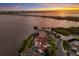 Beautiful waterfront home with amazing water views and mature landscaping at 705 Riviera Dunes Way, Palmetto, FL 34221