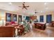 Game room with a billiard table, wet bar, hardwood floors, and ample seating at 705 Riviera Dunes Way, Palmetto, FL 34221