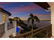 Breathtaking water view from a balcony with decorative railing, offering sunset vistas at 705 Riviera Dunes Way, Palmetto, FL 34221