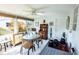 Sunroom features tile floors, a ceiling fan, and great natural light at 753 Wilkie St, Dunedin, FL 34698