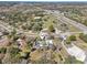 Overhead view of property highlighting the home, pool, surrounding landscape, and nearby road access at 8376 Sycamore Dr, New Port Richey, FL 34654