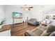 Another view of this living room features neutral colors, offering space for relaxation and entertainment at 8376 Sycamore Dr, New Port Richey, FL 34654