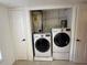 Convenient laundry closet with full-size washer and dryer at 10346 Carrollwood Ln # 171, Tampa, FL 33618
