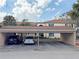 Designated covered parking spaces provide convenience and protection from the elements for residents at 10346 Carrollwood Ln # 171, Tampa, FL 33618