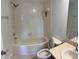 Standard bathroom showcasing a shower-tub combo and a toilet next to the sink with a mirror at 11713 Summer Springs Dr, Riverview, FL 33579