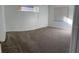 Cozy bedroom with neutral walls, wall to wall carpet, and a window providing natural light at 11713 Summer Springs Dr, Riverview, FL 33579