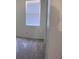 Bright bedroom featuring neutral carpet and a sunlit window at 11713 Summer Springs Dr, Riverview, FL 33579