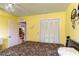 Bedroom featuring closet and ceiling fan, showcasing comfort at 12227 Darwood Dr # 0, Hudson, FL 34667