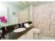 Elegant bathroom featuring granite counters and stylish décor at 18934 Avenue Biarritz, Lutz, FL 33558