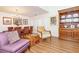 Elegant dining room with wood floors, chandelier, and built in at 18934 Avenue Biarritz, Lutz, FL 33558