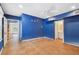 Spacious bedroom featuring tile flooring, neutral walls, and ceiling fan at 2508 W Shell Point Rd, Tampa, FL 33611