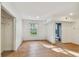Bright bedroom with tile floors, natural light, and ensuite bathroom at 2508 W Shell Point Rd, Tampa, FL 33611