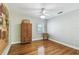 Light and airy bedroom with hardwood floors and neutral walls at 2508 W Shell Point Rd, Tampa, FL 33611