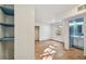 Bright bedroom with tile flooring, closet, and adjoining bathroom with single vanity at 2508 W Shell Point Rd, Tampa, FL 33611