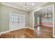Elegant foyer featuring decorative hardwood floors and views into other rooms at 2508 W Shell Point Rd, Tampa, FL 33611