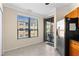 Bright eat-in kitchen area with stainless steel appliances, wood cabinets, and a view to a balcony at 2717 Via Cipriani # 620A, Clearwater, FL 33764