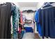Organized walk-in closet with plenty of storage space for clothing and accessories at 2717 Via Cipriani # 620A, Clearwater, FL 33764