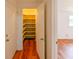 Walk-in pantry has ample storage shelves for optimal organization at 3302 W Van Buren Dr, Tampa, FL 33611