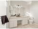 Bathroom features double vanity, tiled floor, and a large mirror with modern lighting at 6980 Ulmerton Rd # 8C, Largo, FL 33771