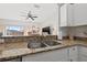 Granite countertops and stainless steel sink in a modern kitchen at 6980 Ulmerton Rd # 8C, Largo, FL 33771