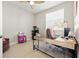 Bright office with a ceiling fan, a large window, wood floors, and a modern desk at 6980 Ulmerton Rd # 8C, Largo, FL 33771
