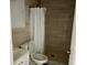 Updated bathroom featuring a shower and sleek fixtures at 8503 N Willow Ave, Tampa, FL 33604