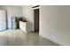 Interior view with kitchenette and access to other rooms at 8503 N Willow Ave, Tampa, FL 33604