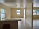 Open concept home with breakfast bar and tile floors throughout at 8503 N Willow Ave, Tampa, FL 33604