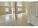 Open living area features tile flooring, natural light at 8503 N Willow Ave, Tampa, FL 33604