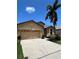 Attractive single-story home with a two-car garage and well-maintained landscaping at 116 Silver Falls Dr, Apollo Beach, FL 33572