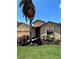 Beautiful single-story home featuring a well-manicured lawn and vibrant, tropical landscaping at 116 Silver Falls Dr, Apollo Beach, FL 33572