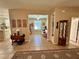 Bright and open living space seamlessly connects the living room, kitchen, and dining area at 116 Silver Falls Dr, Apollo Beach, FL 33572
