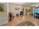 Relaxing sitting area with neutral colors, natural light, and comfortable seating for a cozy and inviting atmosphere at 116 Silver Falls Dr, Apollo Beach, FL 33572