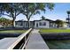 Backyard featuring a deck and a water view at 1514 Sea Gull S Dr, St Petersburg, FL 33707